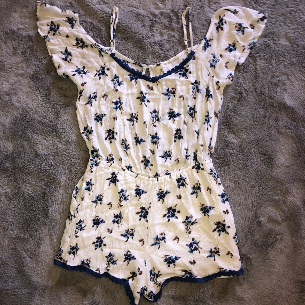 White, blue, and brown floral romper